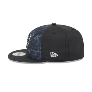 Blue cap with white logo on a white background