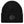 A black ribbed knit beanie hat featuring a tonal dark gray embroidered Chicago Blackhawks logo on the front cuff, with a small black '47 brand tag on the right side of the cuff.