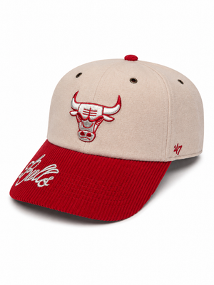 A structured baseball cap with a light beige crown and a red corduroy brim. The front features an embroidered Chicago Bulls logo, and the brim is embroidered with the word 'Bulls' in white script.
