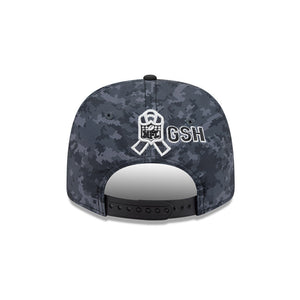 The back of a dark gray digital camouflage baseball cap with a white embroidered ribbon and 'GSH' text on the crown, shown on a plain white background.