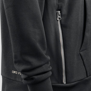 Close-up of a black jacket with a zipper and 'Dri-FIT' branding on the sleeve.