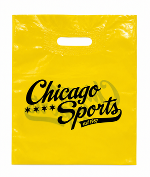 A bright yellow plastic shopping bag with a die-cut handle, featuring a black 'Chicago Sports' logo and 'est. 1987' printed on the front, set against a plain white background.
