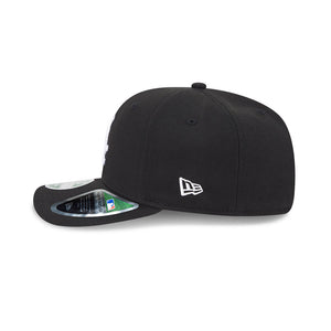 Green baseball cap with a logo on a white background